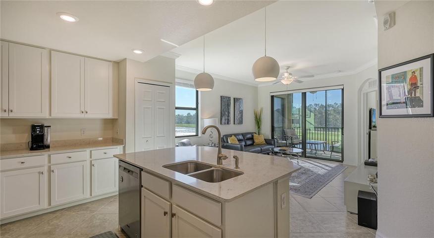 Quartz counter tops and white shaker cabinets.