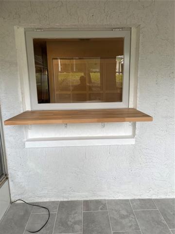 pass thru window Fl. rm. to kitchen