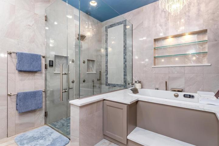 Multiple shower control options. Panel controls both inside and outside the shower.