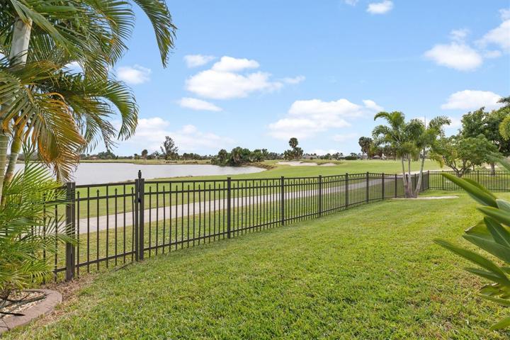 Fenced in backyard on the 9th fairway.