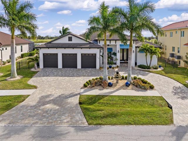 2018 Harbor Homes construction with paver circular drive.