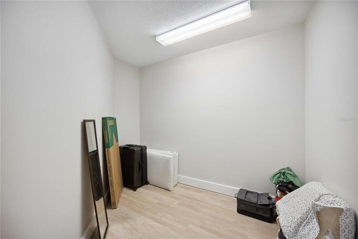 Primary bedroom closet has had custom shelving added.