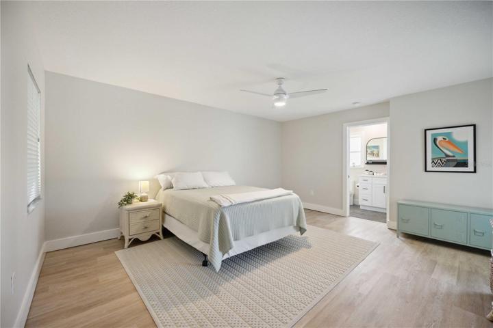 Two primary bedrooms on opposite wings of the home.