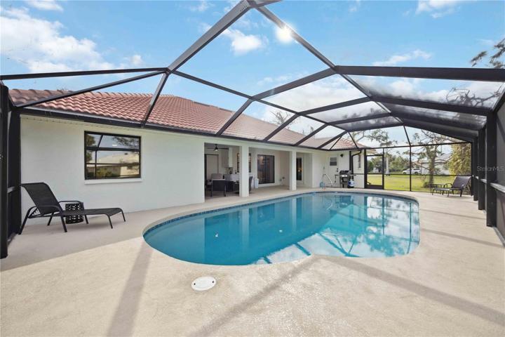 Large pool. Heat pump and solar cover!