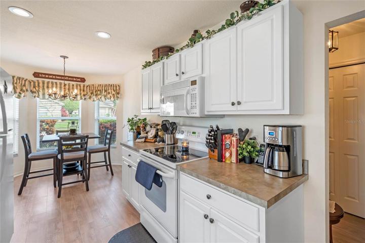 White Cabinetry and Recessed Lighting