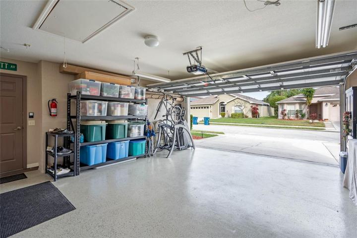 Pull Down Attic Stairs & Durable Epoxy Painted Garage Floors