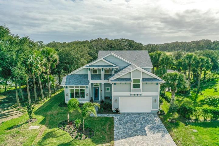 Palms surround Property w/Manicured Landscaping