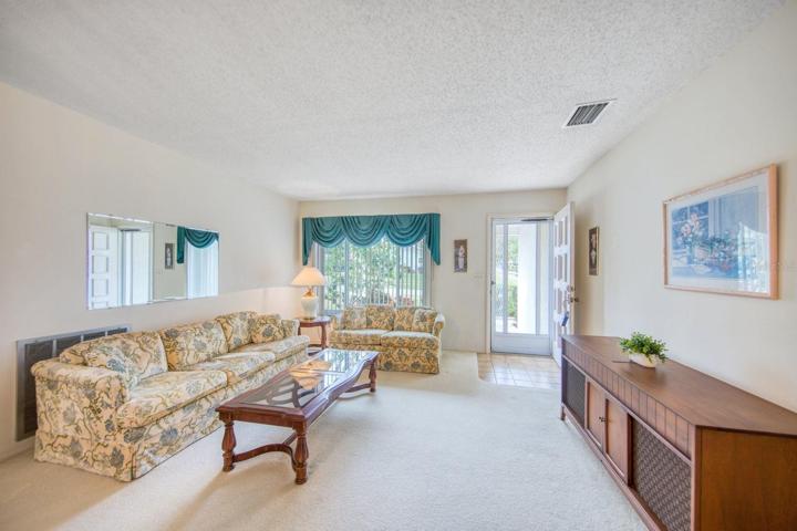 Living room to front door & window~