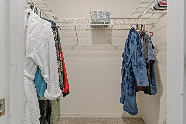 WALK IN CLOSET IN THE PRIMARY BEDROOM