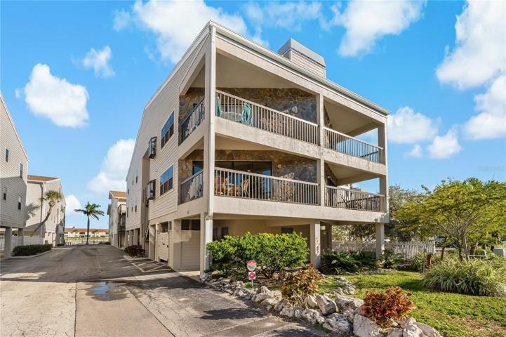 ENJOY THIS 16 UNIT CONDO COMMUNITY IN INDIAN SHORES!