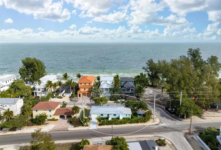 Property has 2 access points on N Shore Drive and N Bay Drive and comes with 4 permitted parking spots