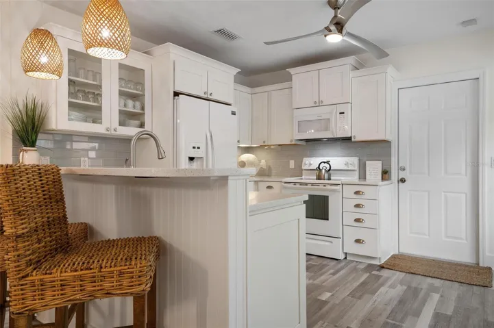 Kitchen with eat in bar area