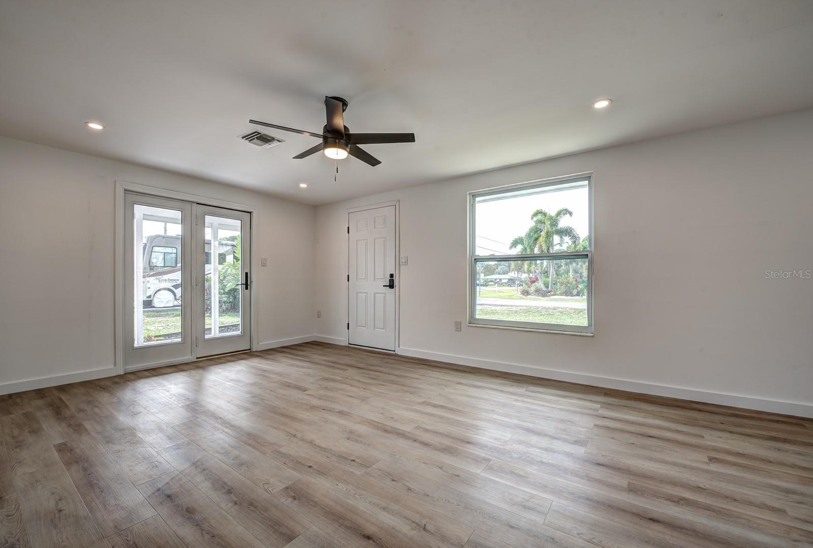 French doors lead to the covered lanai.
