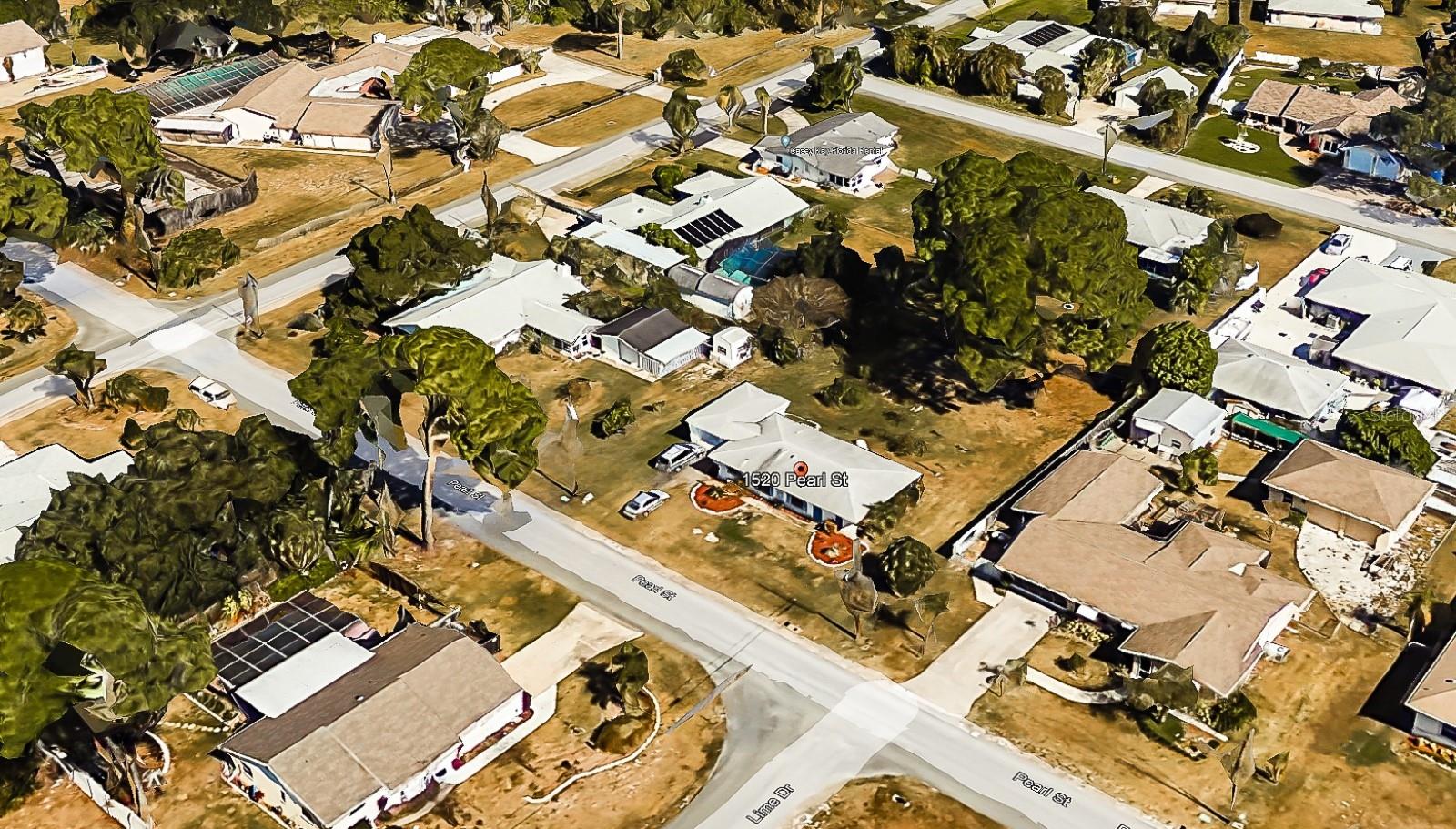 An aerial view of the huge lot with no deed restrictions or homeowners association.