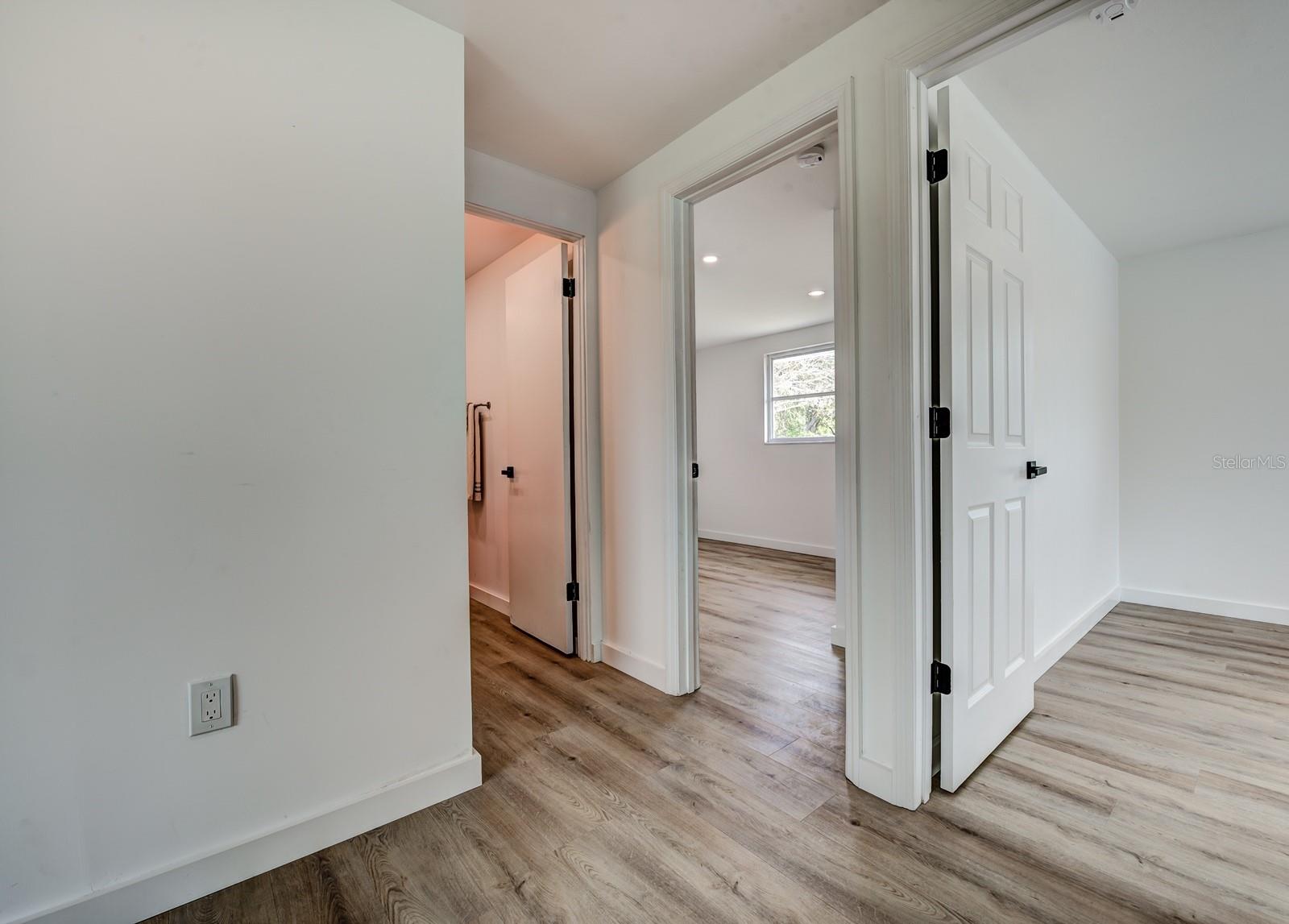 Looking into bedrooms 2 and 3 and bath 2.