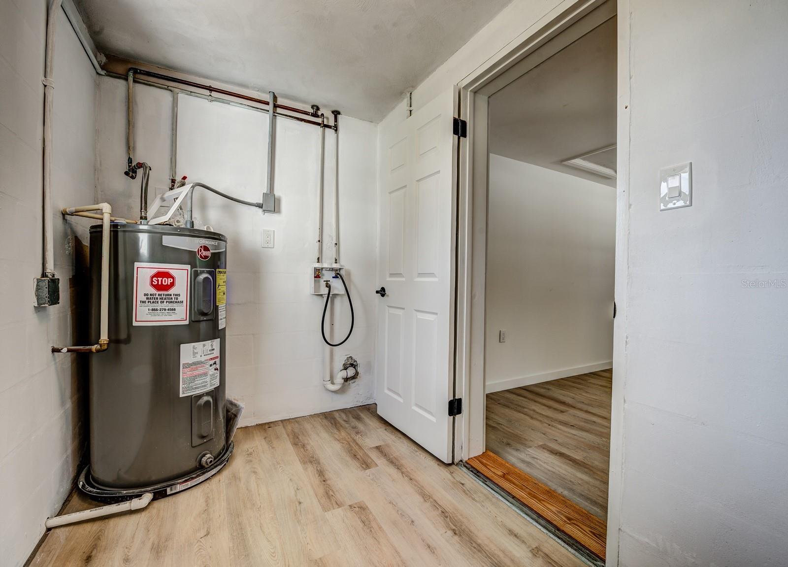The indoor laundry and storage room measures a generous 11x6.