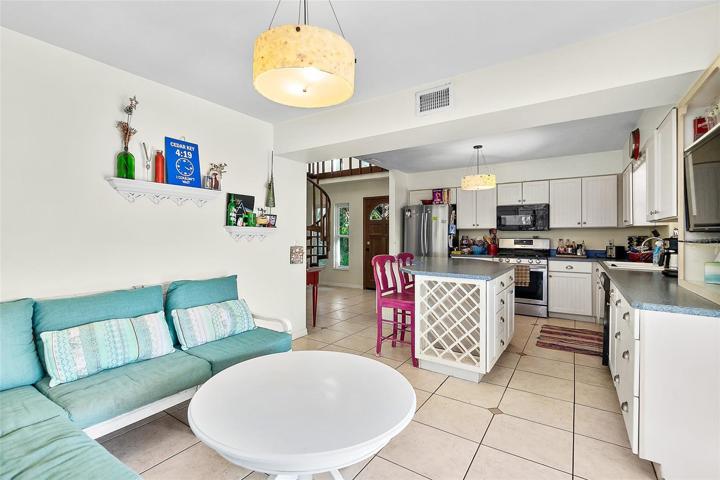 Dining or lounging area adjacent to kitchen.