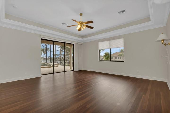 Primary Bedroom - sliding doors/view to lanai
