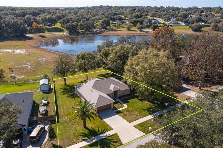 Aerial photo showing the space between homes and lake behind