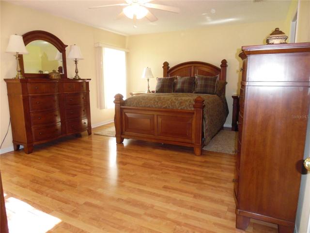 Living area with sliding glass doors leading to back patio