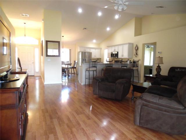 Entry hall with doorway leading to 4th bedroom at front of home