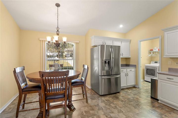 Plenty of space at front window inside kitchen for your table