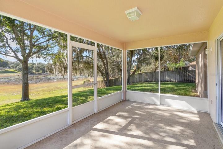 Screened rear patio showcasing the great view