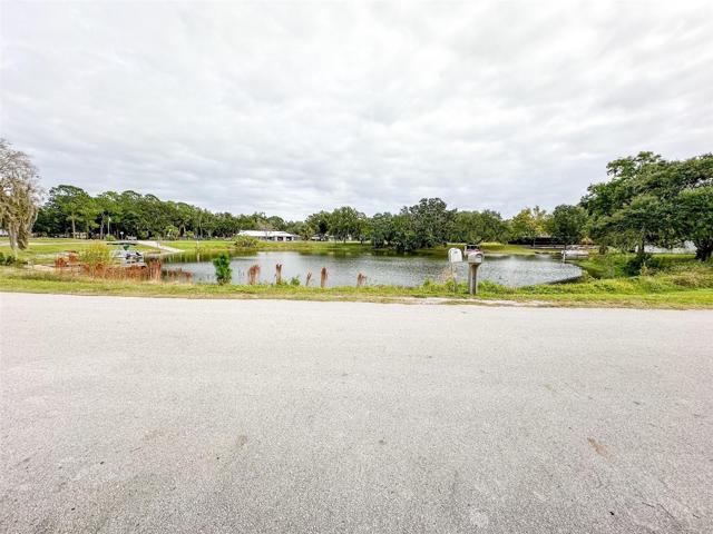 Pond with boat ramp and canal to Lake Rosalie