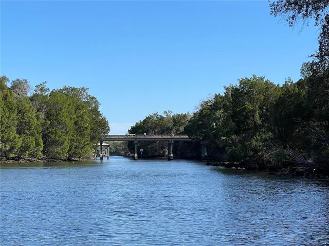 Canal route to river, high bridge, bring your boat