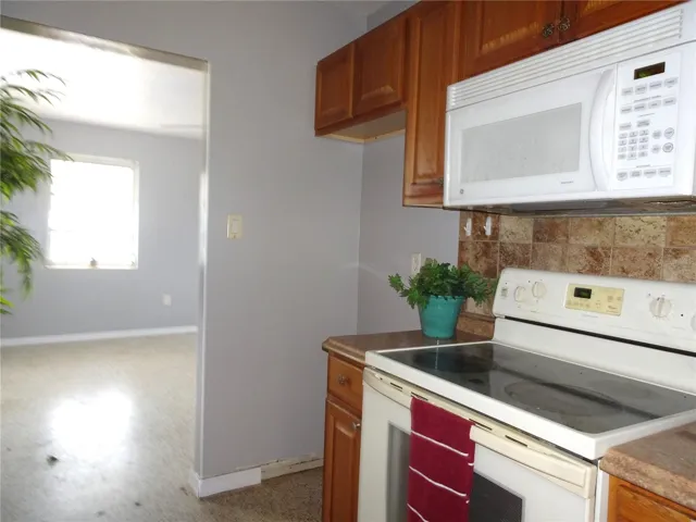 Kitchen looking into Livingroom