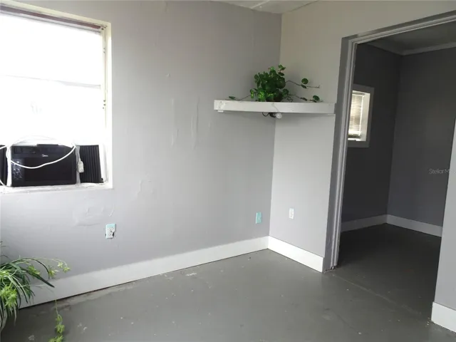 3rd bedroom looking into walk in closet.