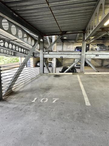 Reserved parking spot #107 across from 2nd flr door
