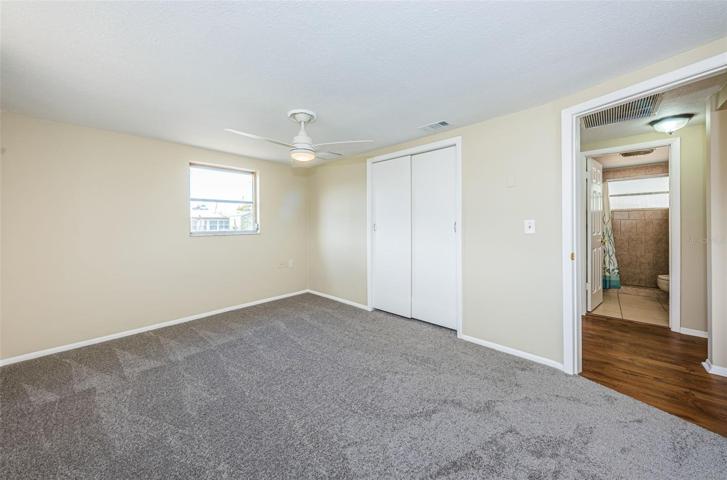 Masterbedroom/Primary with new carpeting