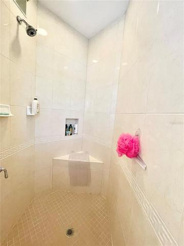 Walk in shower with built in bench