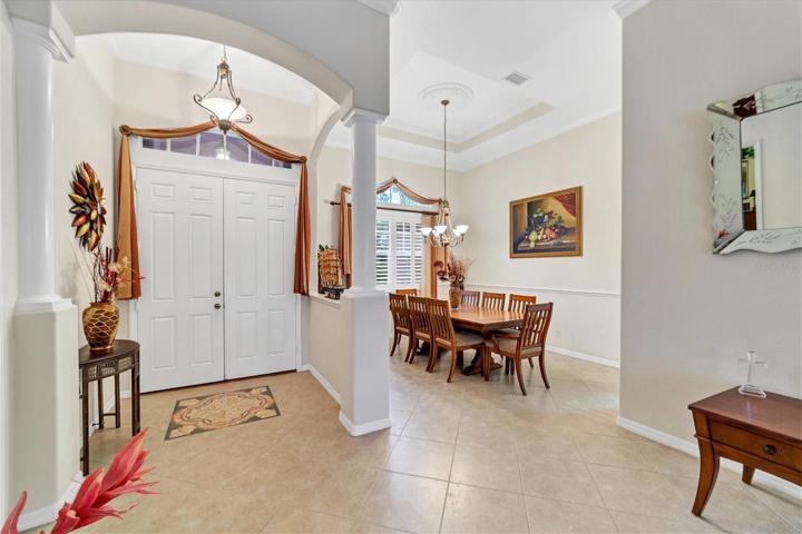 Foyer 12' ceiling, double door transom entry