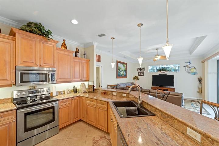 Kitchen to family room; large breakfast bar