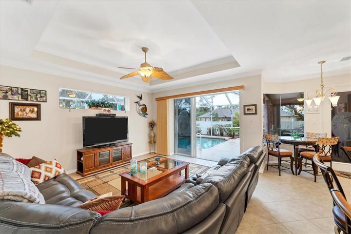 Family room, triple sliders to pool and lanai