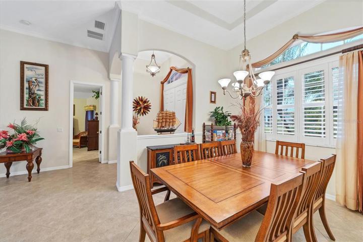 Dining room 13' coffered ceiling, transom window