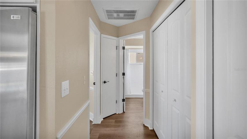 hallway bedroom 3 on left and guest bath on right