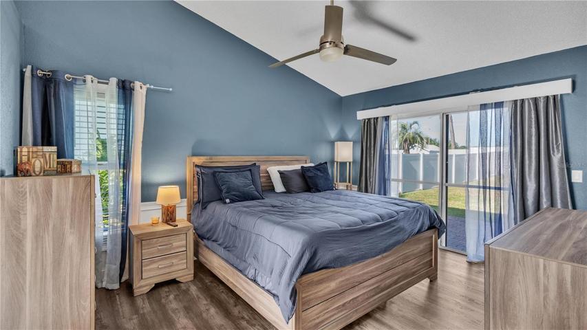 Primary bedroom with sliders