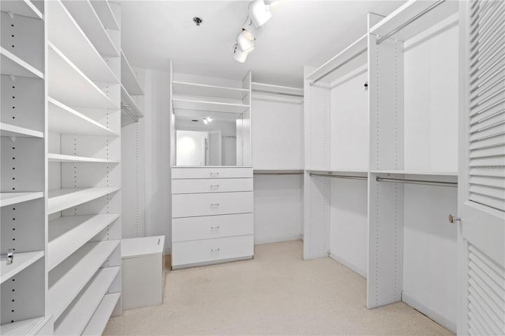 One of Two Large Walk-in Primary Suite Closets