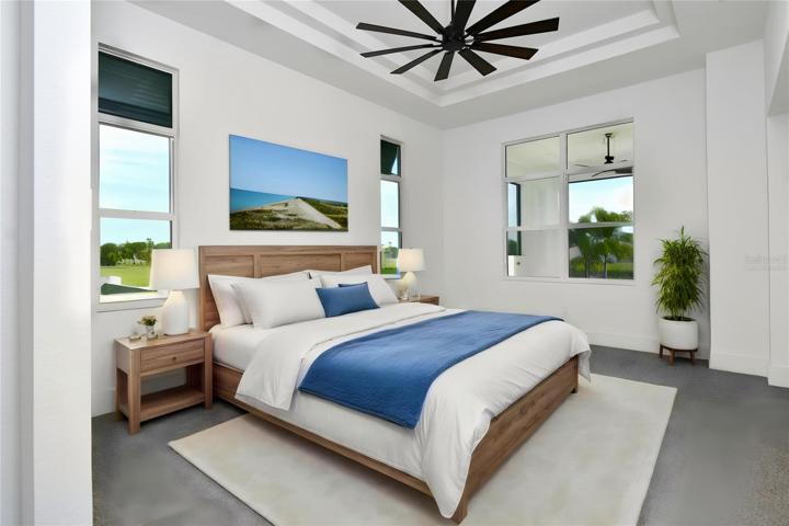 Virtually Staged: The owner's suite is designed to offer maximum comfort and convenience, featuring two walk-in closets and a cabinet linen closet.