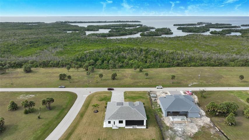 The residence is situated on one of the larger lots in the community and borders an expansive lake.  It is tucked away from traffic, making it a peaceful, serene, and picturesque location.