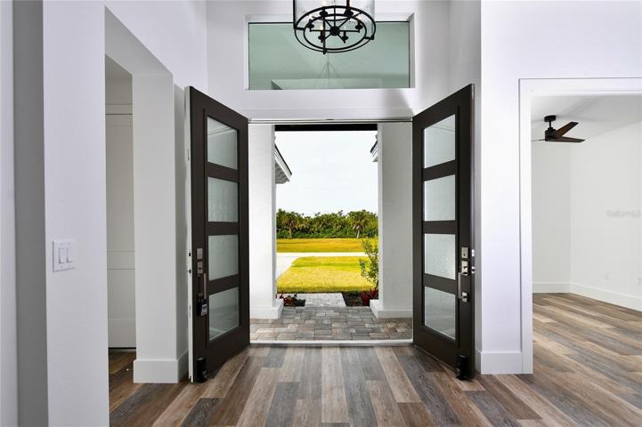 Step inside the beautiful French Door entryway and be prepared to fall in love with all the custom features and extraordinary upgrades that set this home apart from all others.