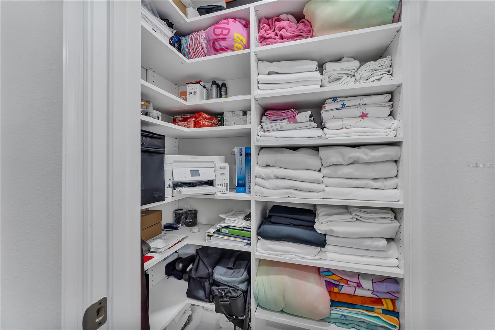 LINEN CLOSET WITH CUSTOM SHELVES