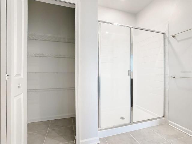 Primary bathroom with huge linen closet