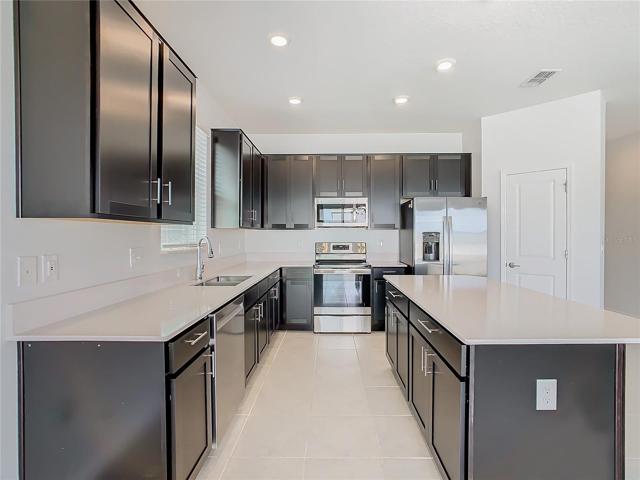 Quartz countertops throughout