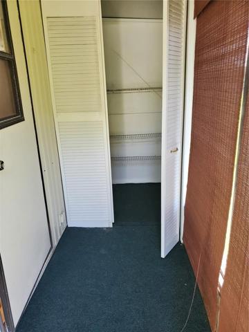 Enclosed side porch and storage
