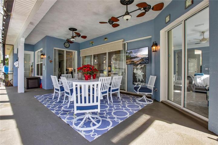 Plenty of seating under the covered porch area.