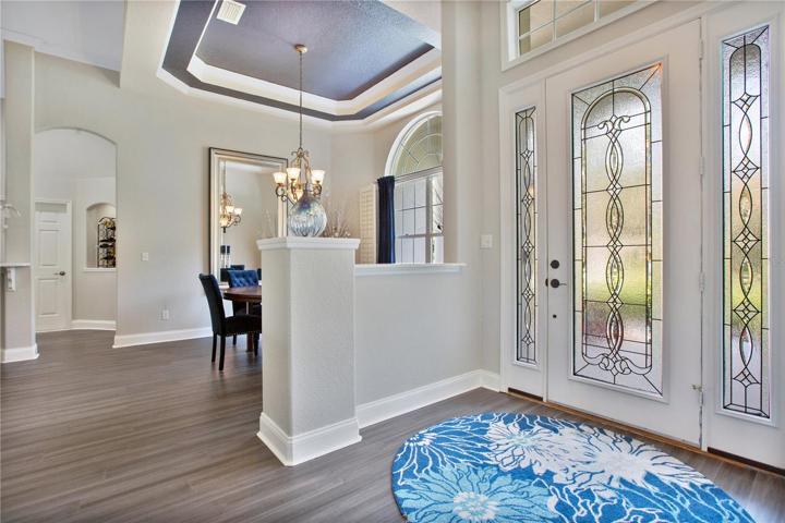 Spacious entryway - note the high ceilings throughout